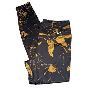 Nike Gray and Gold Patterned Leggings